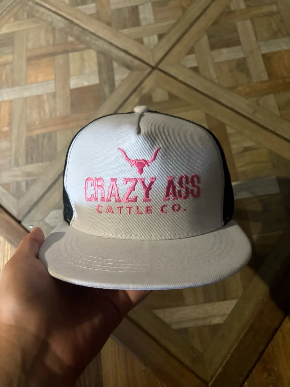 Crazy Ass Cattle Co. white & black hat with pink logo